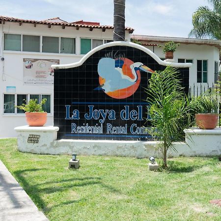Capital O La Joya Del Lago آجيجيك المظهر الخارجي الصورة