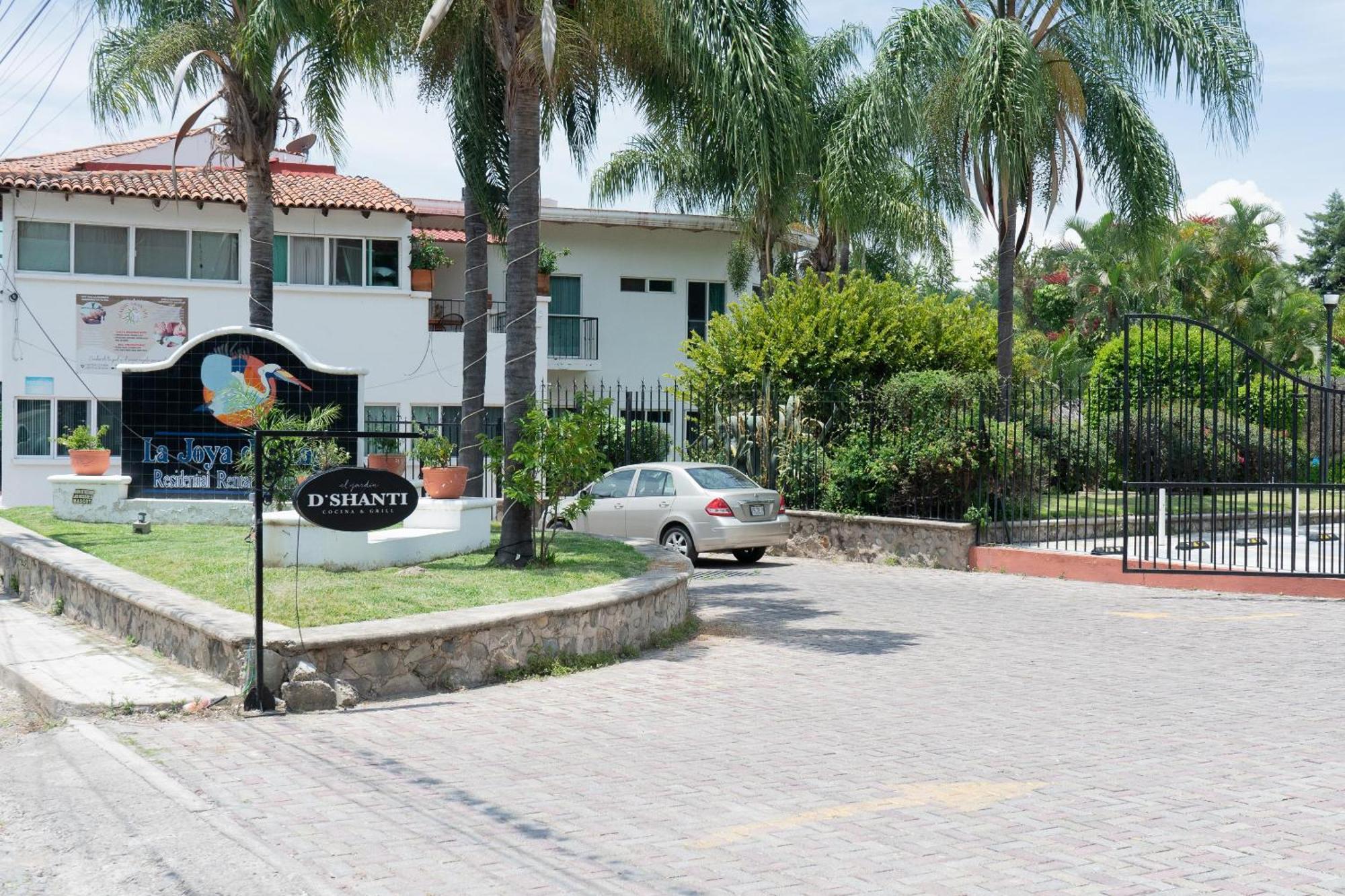 Capital O La Joya Del Lago آجيجيك المظهر الخارجي الصورة
